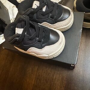 Jordan 4 black and tan 2c